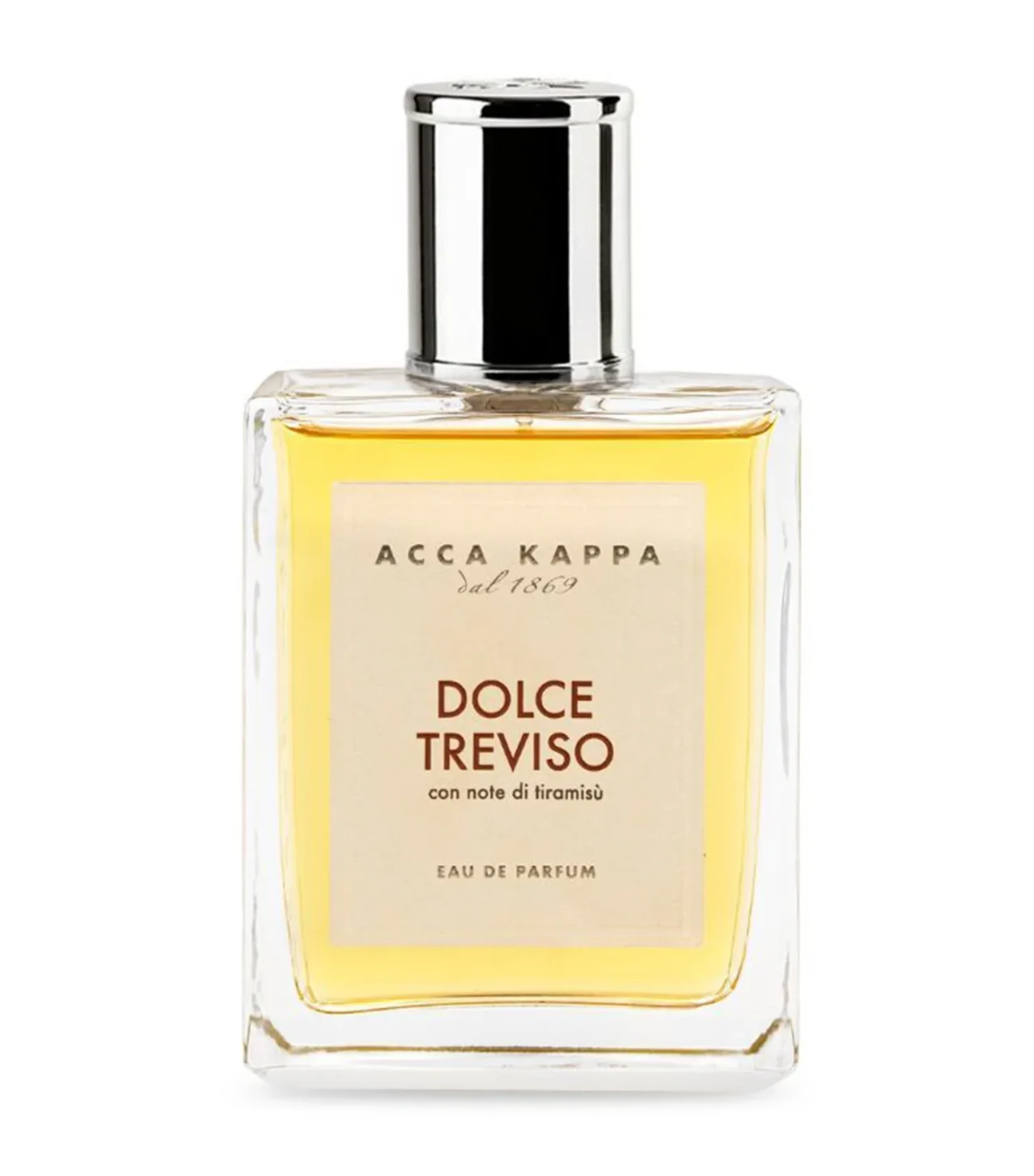 Dolce Treviso perfume bottle by Acca Kappa in a rectangular glass bottle with a silver cap and pale label, filled with yellow perfume.