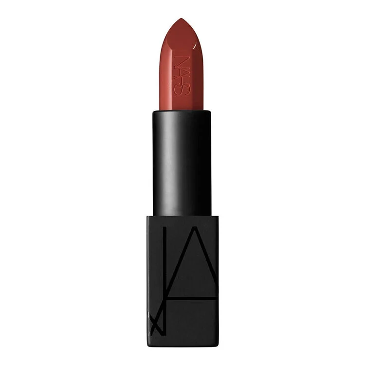 NARS lipstick in a red shade with a black square case, cap removed showing the bullet.