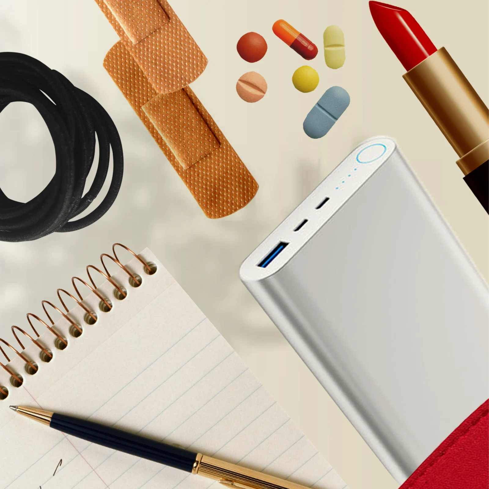 Assorted stationery items on a beige background: spiral notebook, black pen, coiled cord, and lipstick in a collage-style still life.