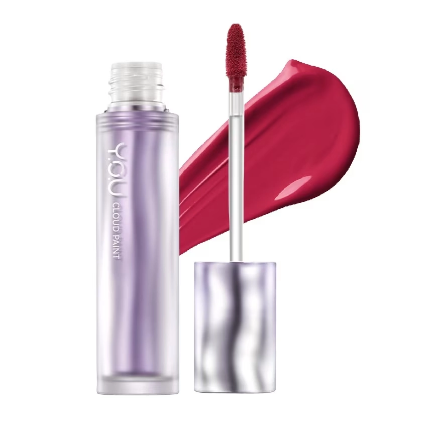 Lip gloss bottle with wand applicator and magenta swatch in the background, purple-tinted container ready to use for lips.