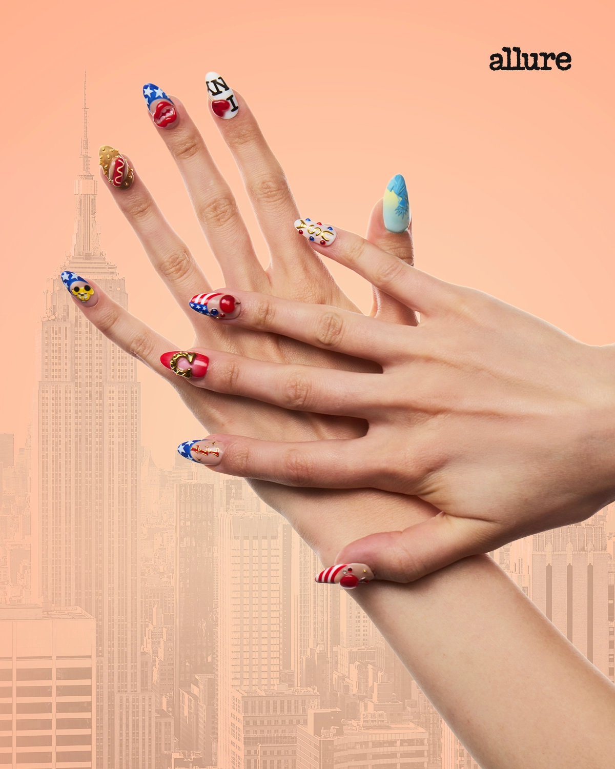 Hands with long patriotic nail art (stars and stripes) and colorful designs against an orange skyline backdrop with 'allure' logo.
