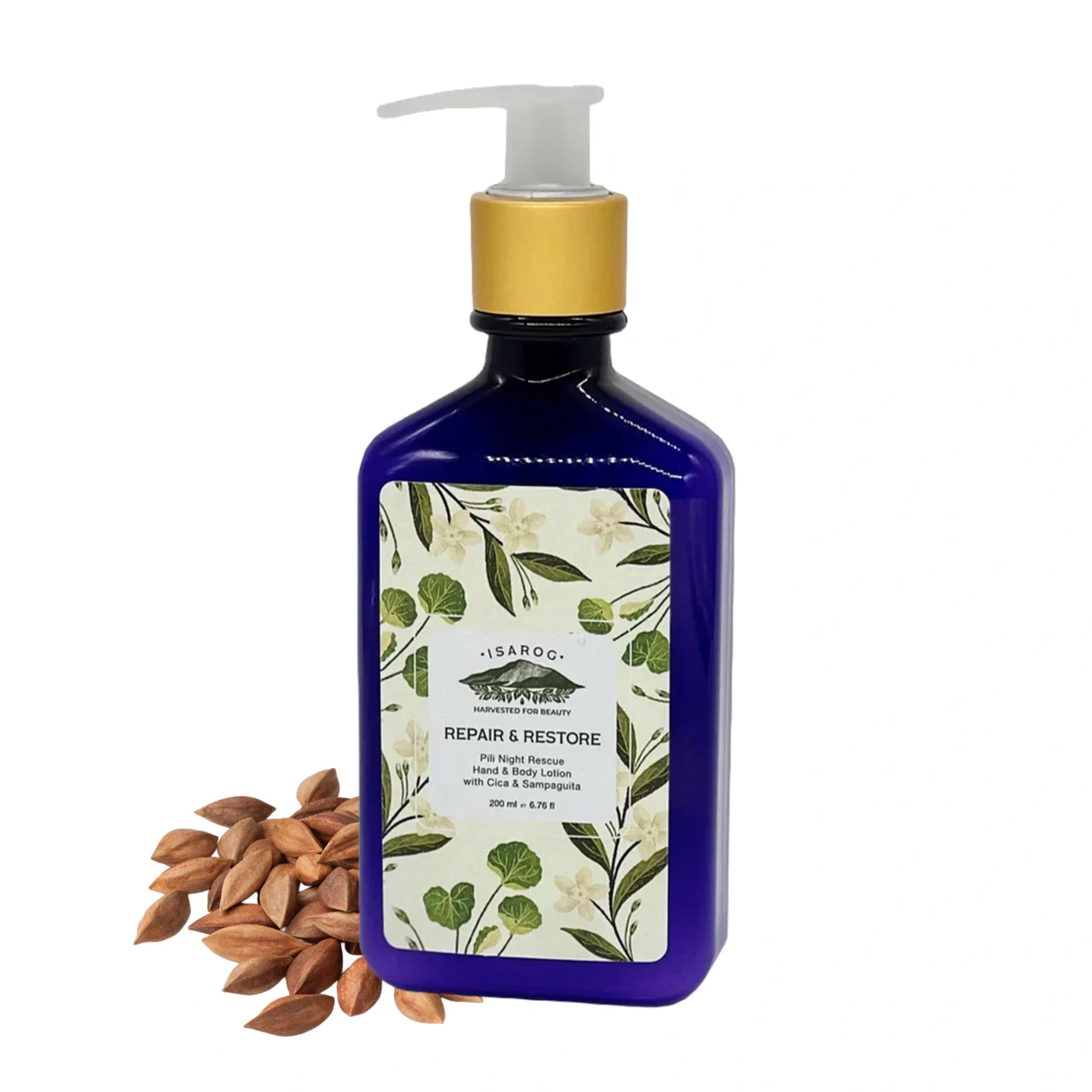 Blue bottle with a white pump and a floral botanical label, with almonds arranged at its base.
