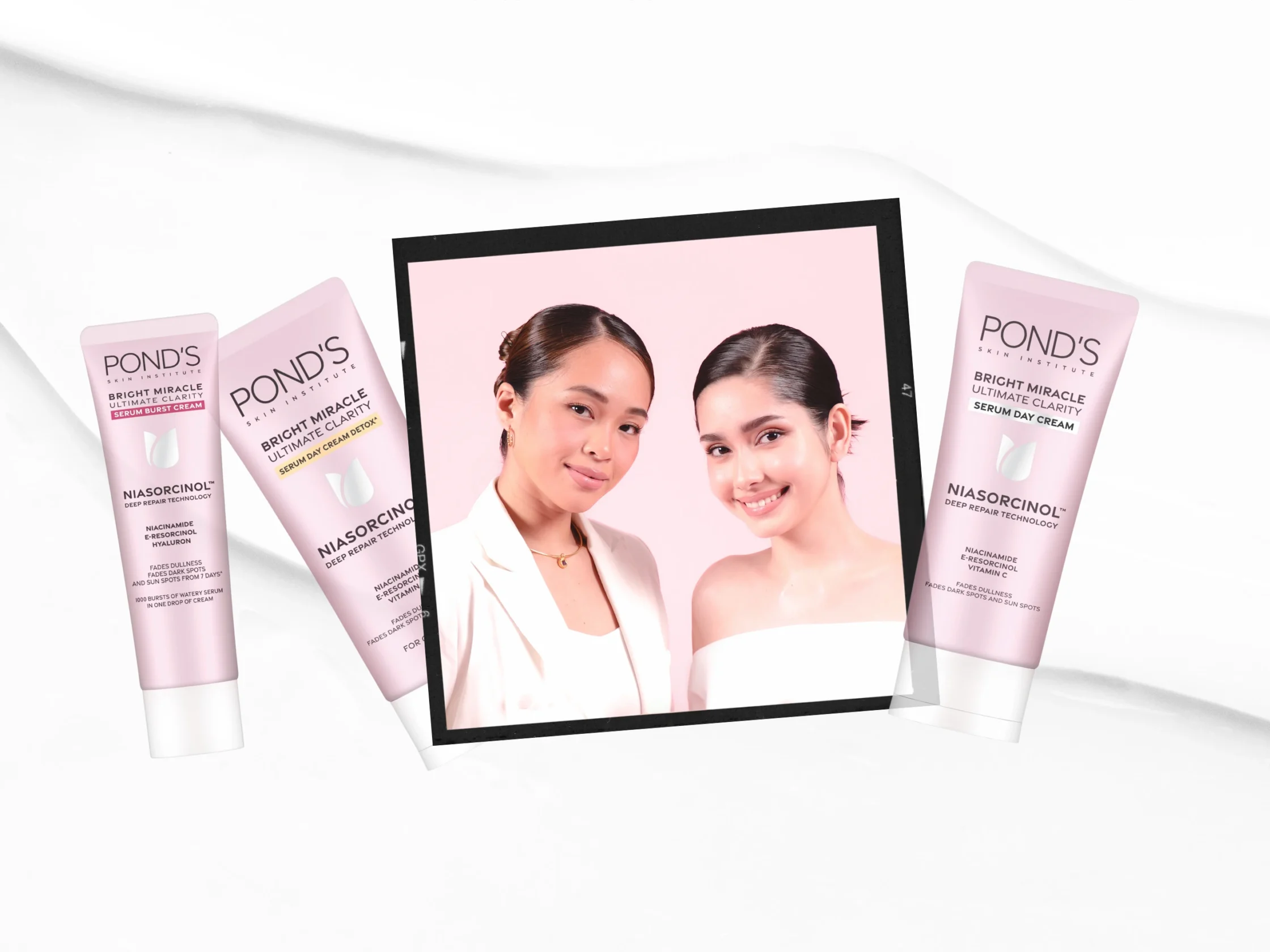 Pond's skincare ad with two women in a pink frame and multiple pink tubes surrounding them.